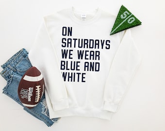 On Saturdays We Wear Blue and White Sweatshirt