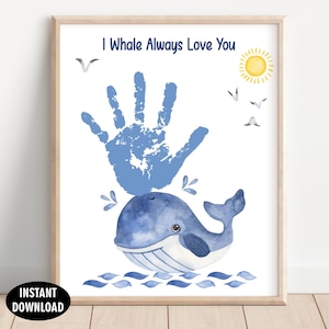 May include: A framed wall art print featuring a blue watercolor whale with a blue handprint above it, resembling a water spout. The text I Whale Always Love You is printed at the top, with a yellow sun and small birds in the sky above the whale.