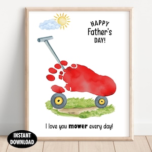 May include: A framed watercolor print for Father's Day. The artwork features a red wagon shape made from a footprint, with the text "Happy Father's Day!" and "I love you mower every day!" A sun and cloud are also depicted.