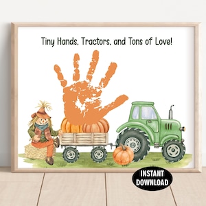 May include: A framed print with the text "Tiny Hands, Tractors, and Tons of Love!" features a large orange handprint, pumpkins, a green tractor, and a scarecrow. A pumpkin sits in front of the tractor. The words "Instant Download" are in a black oval.