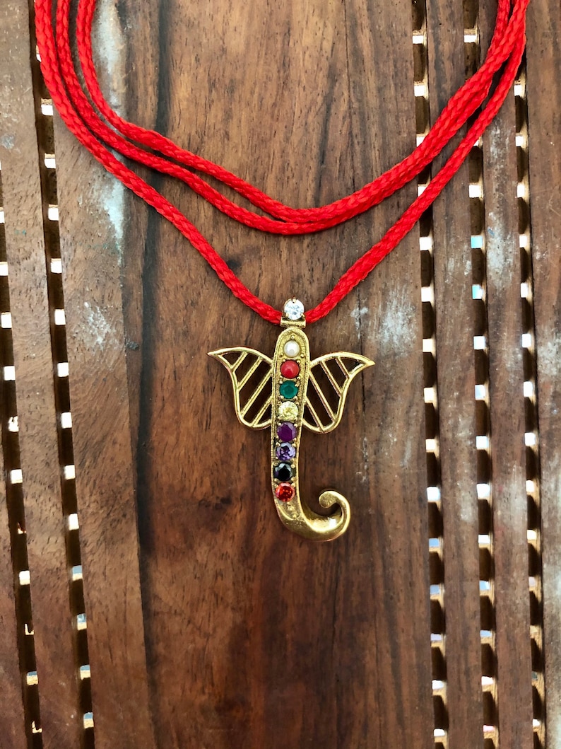 Healing pendant with auspicious red thread Navratna Nine stone Planetary Ganesha pendant
