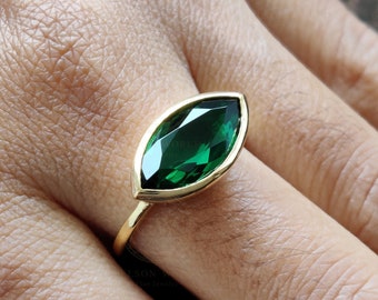 4 Ct Marquise Green Emerald Engagement Ring - East West Bezel Set in Solid Gold