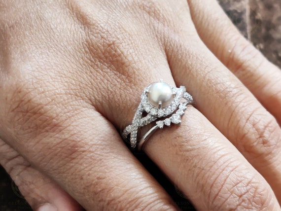 Pearl halo engagement on sale rings