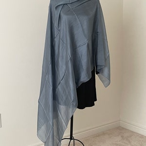 Silvery grey in indirect light