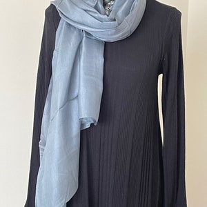 Silvery grey in bright daylight