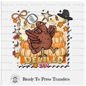 May include: Thanksgiving-themed graphic with a cartoon turkey balancing deviled eggs on plates. The design includes pumpkins, fall leaves, a pilgrim hat, and the words "Deviled Eggs". The text "Ready To Press Transfers" is also present.