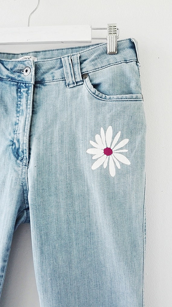 daisy painted jeans