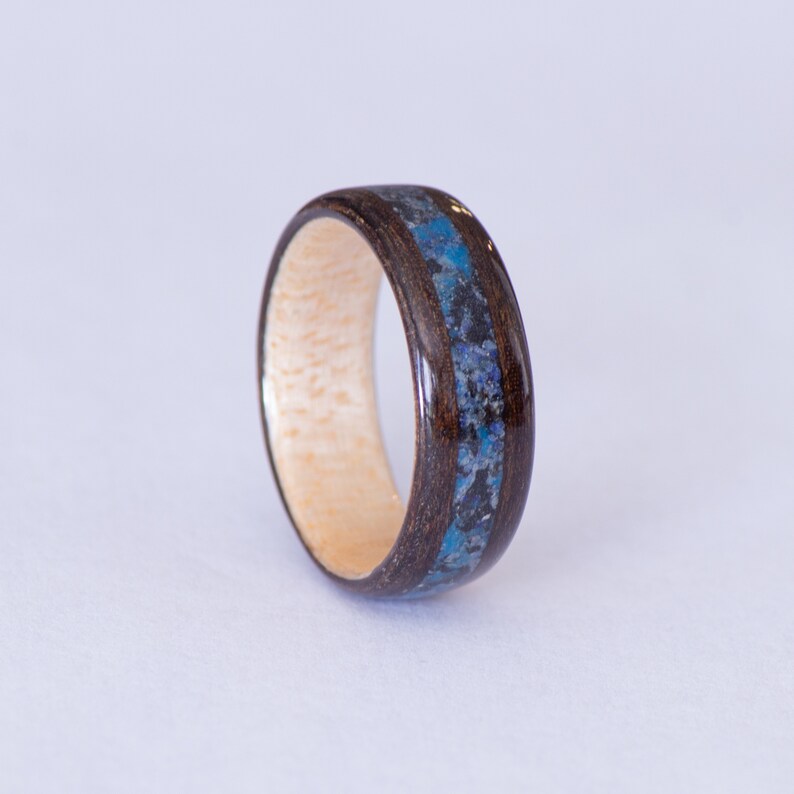 Ipe and maple bentwood ring with blue camo stone inlay