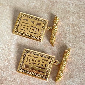 18k yellow gold Asian cufflinks