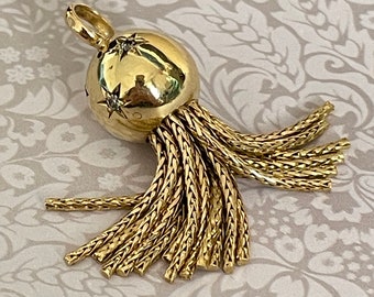 Vintage pendant with a sphere and tassel in 18k gold and diamonds