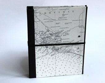 Folder A5 with clamping mechanism concealed with seafaring map of the west coast of Ceylon