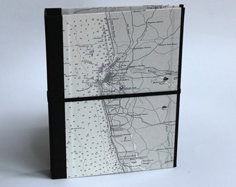 Folder A5 with clamping mechanism concealed with seafaring map of the west coast of Ceylon