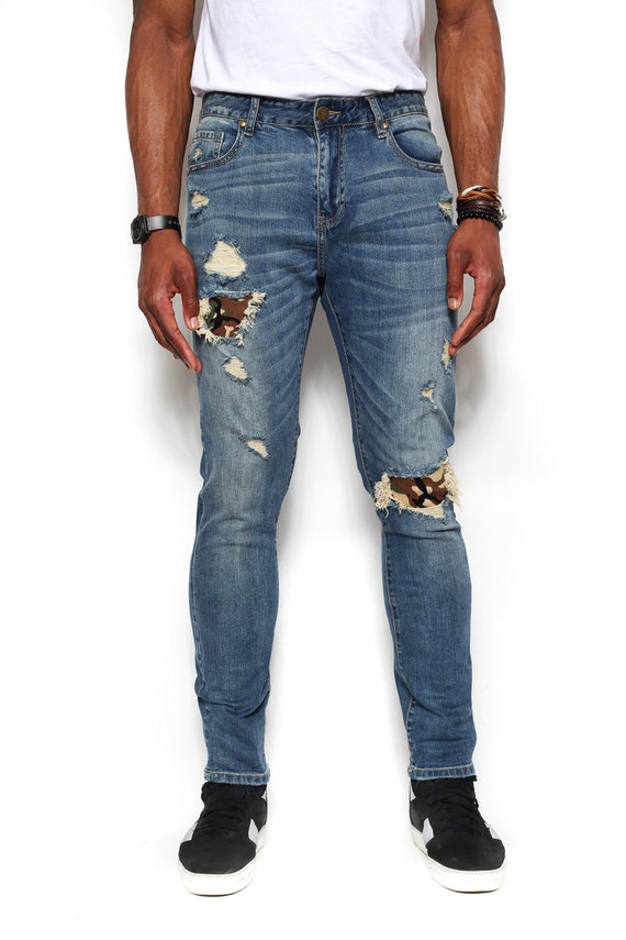 ripped jeans with camo patches
