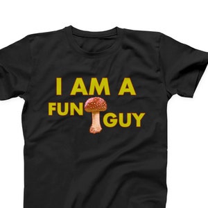 May include: Black t-shirt with yellow text that reads "I am a fun guy" and a red and white mushroom graphic.