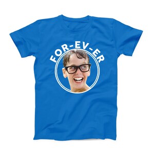 May include: A blue t-shirt with a white circle graphic featuring a boy with glasses and the text "FOR-EV-ER".