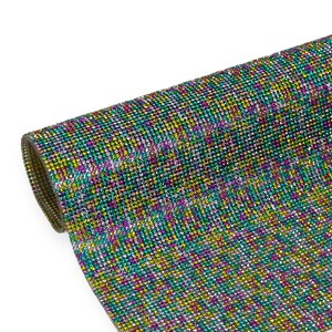 May include: A rolled sheet of shimmering fabric, covered in tiny, colorful rhinestones. The colors include green, yellow, purple, and silver, creating a dazzling, textured surface. The material is likely used for crafts or embellishments.