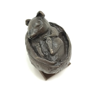 Sleeping mouse in walnut, cast bronze