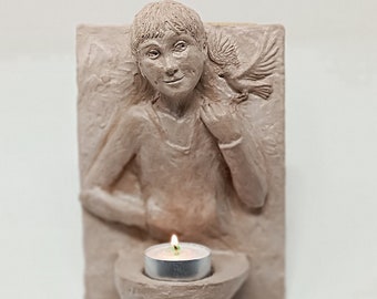 Wall light boy with bird, cast ceramic