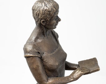 Stand and read, bronze sculpture with oak base