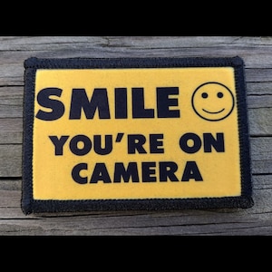 Smile Youre On Camera Morale Patch - Hook and Loop Backing for Backpack, Rucksack, Operator Hat and Much More!