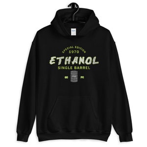 May include: Black hooded sweatshirt with a front pocket and drawstring. The front features the text "ETHANOL SINGLE BARREL" in a distressed, yellow-green font, with "SPECIAL EDITION 1970" above and a barrel graphic.