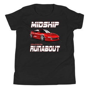 May include: Black t-shirt with a red sports car graphic. The text "MIDSHIP" is above the car, and "RUNABOUT" is below. Japanese text is also present. The car is a stylized illustration.