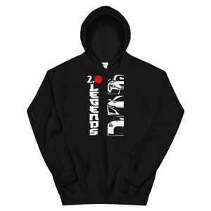 May include: Black hooded sweatshirt with a white graphic design. The design features the text "2.0 LEGENDS" in a vertical format, accompanied by a red circle and three car silhouettes. The sweatshirt has a drawstring hood and a front pocket.