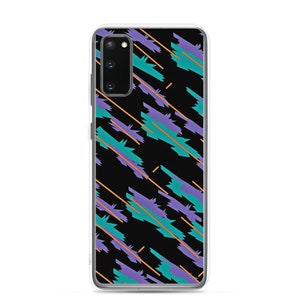 May include: A clear phone case with a black background and a colourful geometric pattern. The design features diagonal lines in teal, purple, and orange. The phone case has a camera cutout and buttons.