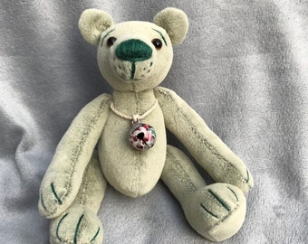 Minty is a collectible Mini sized light green Cashmere bear