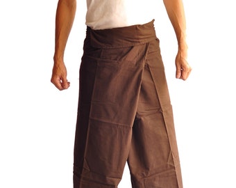 May include: Brown wrap pants with a wide leg design. The pants are made of a soft fabric and are worn with a white tank top. The pants have a wrap-around style and are suitable for casual wear.