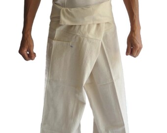 May include: Off-white, loose-fitting pants with a wrap-around waist and a matching tank top. The pants have a relaxed fit and pockets. The outfit is made of a light, breathable fabric, perfect for warm weather or casual wear.