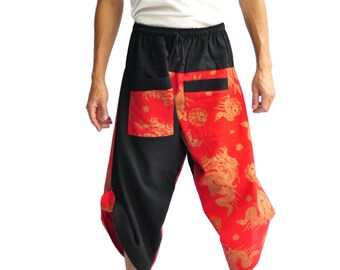May include: Black and red patterned pants with a drawstring waist. The pants feature a dragon design in gold on a red background. The pants have two pockets and a loose, comfortable fit.