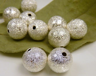 10 STARDUST Perlen - 10mm - Metallperlen, Silber