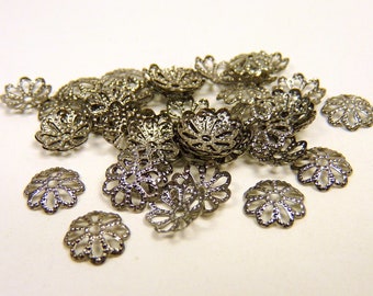 50 Perlenkappen Blumen, 7,5mm schwarz gun metal