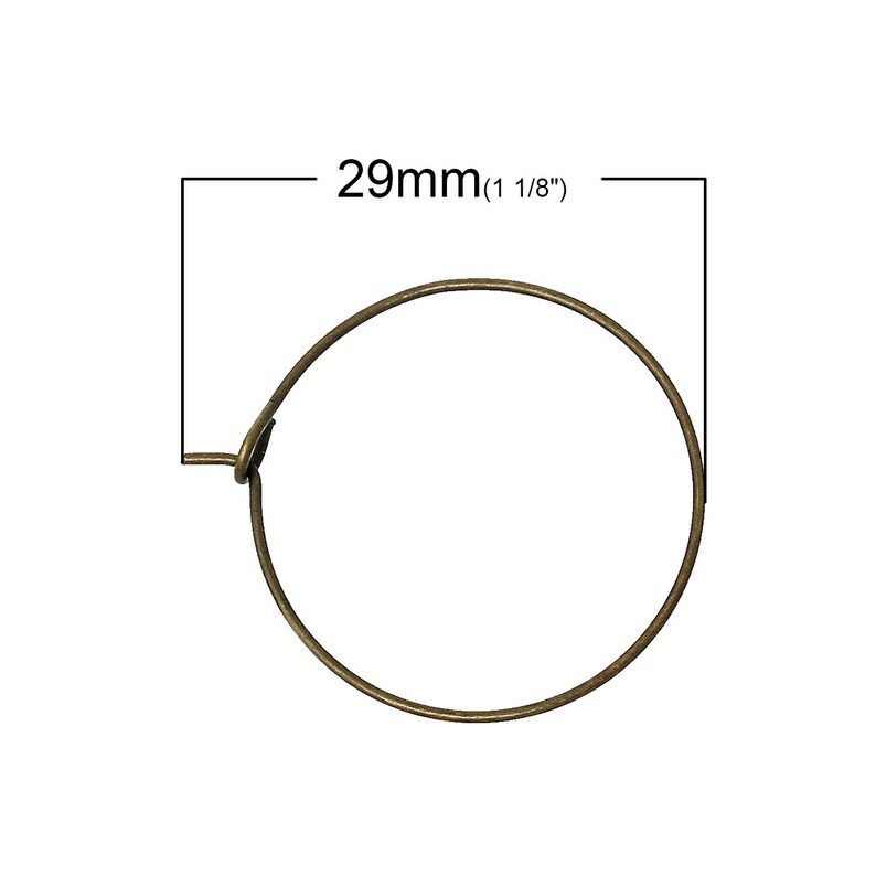 May include: A gold-toned metal hoop earring measuring 29mm (1 1/8 inches) in diameter.