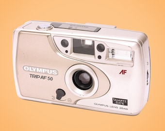 Ist diese Kamera nicht der Hammer?! Olympus Trip AF 50 QD – die perfekte Kamera für Streetfotografie.