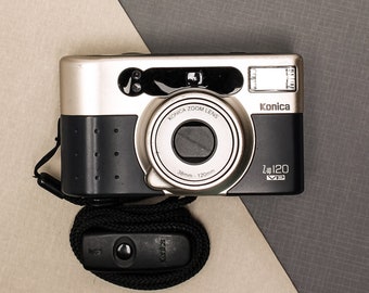 Konica Minolta Z Up 120 VP con estuche, correa de transporte y control remoto desmontable!