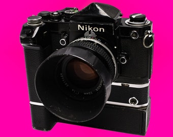 Nikon F2 noir avec prisme DE-1, MD-2/MB-1, 50 mm F1.4 Nikkor Journalist Iron Horse