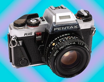 Pentax ZX-30 35mm Film Slr With an Auto Focus SMC Pentax-fa 28