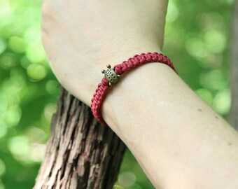 Red Square Knot, Bronze Ladybug Bead Bracelet