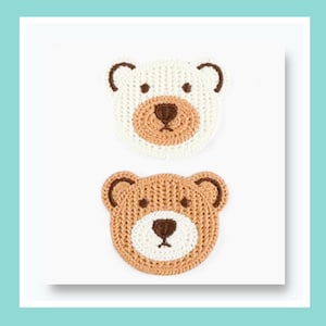 May include: Two knitted bear face appliques. One is white with a tan snout and brown details, the other is tan with a white snout and brown details. The appliques are round with curved ears.