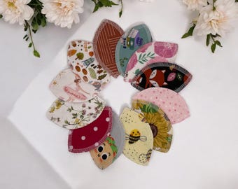 Compresas interlabiales - Compresas interlabiales con forma de pétalo, estampados sorpresa - Paquete de 12 compresas interlabiales reutilizables y lavables de franela 100% algodón.