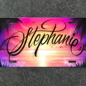 Airbrushed beach scene license plate