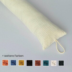May include: White doorstop with a ribbed texture and a loop handle.  + weitere Farben.  Additional colors shown include orange, blue, yellow, black, red, teal, cream, and black.