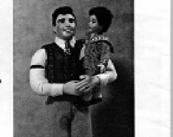 May include: A black and white photograph of a man holding a child. The man is wearing a vest, collared shirt, and tie. The child is wearing a patterned outfit. The figures are standing on a patterned surface.