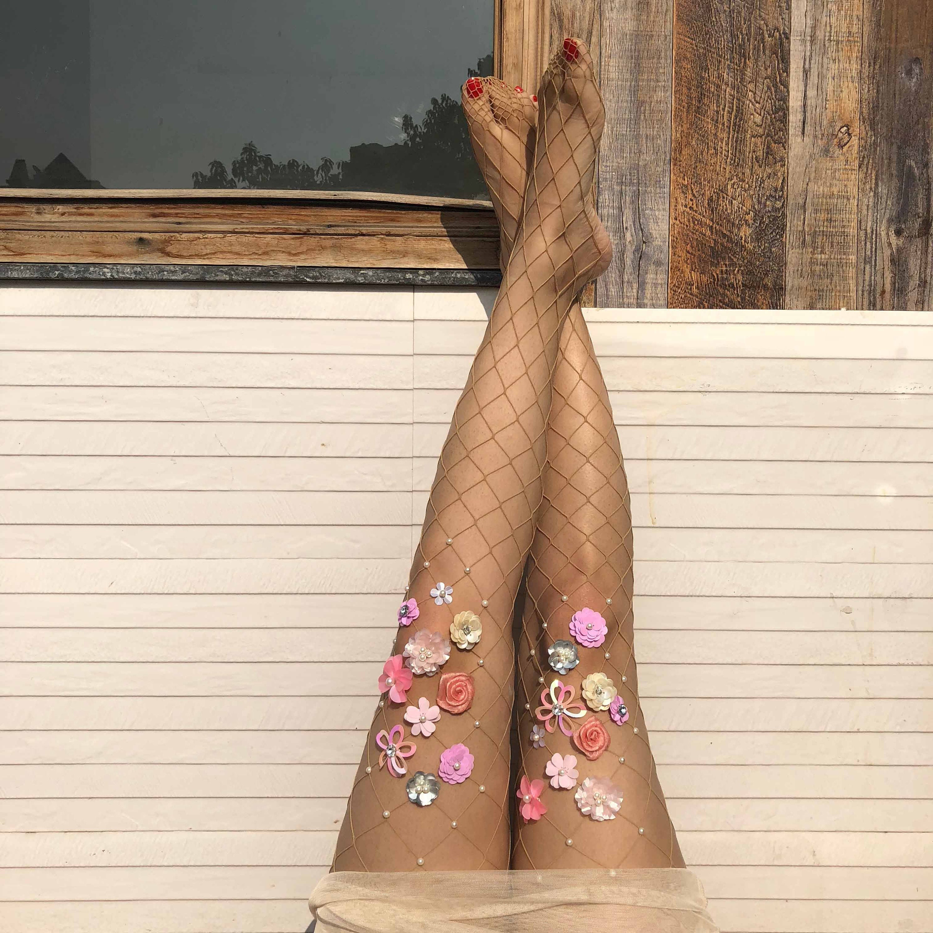 I love her pink fishnets very much