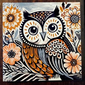 May include: A black and white illustration of an owl with orange and grey feathers, surrounded by orange and white flowers. The owl has large, round eyes and a detailed pattern on its feathers.