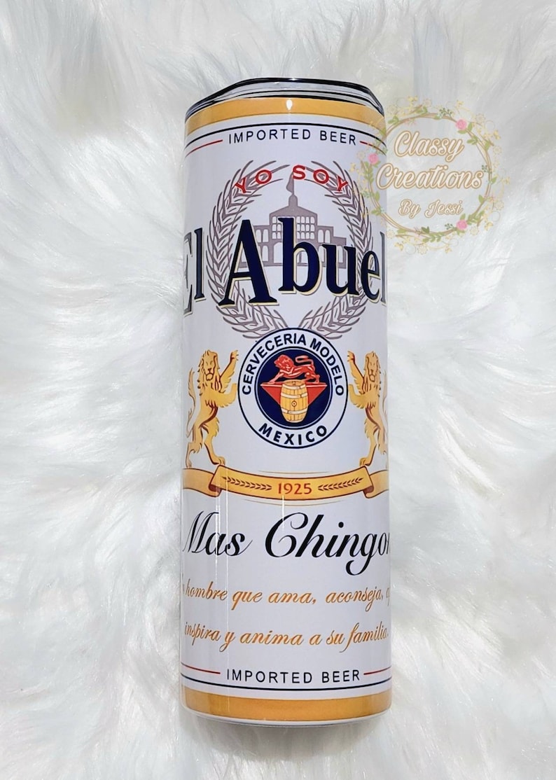 May include: A white and blue can with the text "El Abuel" and "Cerveceria Modelo" in a blue circle with a lion and the text "Mexico 1925". The can also has the text "Mas Chingon" and "IMPORTED BEER" on it.