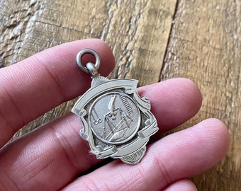 Ornate Vintage Solid Silver Pocket Watch Chain Fob. Antique Hallmarked silver Gymnastics medal pendant