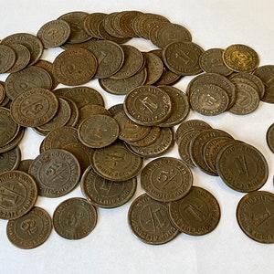 A collection of 100 x Vintage Co op Store Tokens. Money Tokens. Antique Shop Tokens.